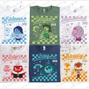 May include: Six t-shirts with cartoon characters and the words "Sadness", "Disgust", "Embarrassment", "Anger", "Envy", and "Anxiety". Each shirt has a unique design with the year "2015" and a checkered pattern.