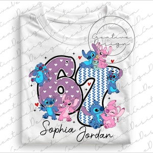 May include: White t-shirt featuring the number "67" with a purple heart pattern and blue and white patterned accents. The shirt includes cartoon characters and the name "Sophia Jordan" in black script.