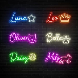 Puede incluir: Letreros de neón con los nombres Luna, Leo, Oliver, Bella, Daisy y Milo. Cada nombre es de un color diferente, con símbolos como una estrella, una corona, una cara de gato, una huella de pata, una flor y un zorro. Sobre un muro de ladrillos oscuros.