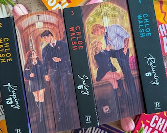 May include: A collection of books by Chloe Walsh, including Keeping 13, Saving 6, and Redeeming 6. The book spines feature illustrations of couples in school uniforms, with titles and author names printed in white and blue text on black backgrounds.