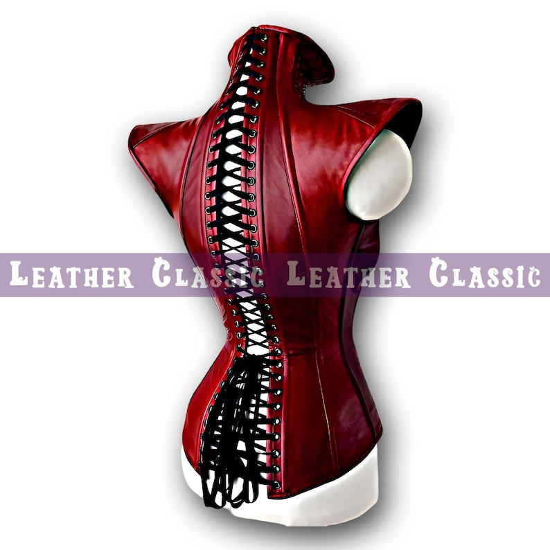 May include: A deep red corset with black lacing down the back. The corset is displayed on a white mannequin bust. The text "LEATHER CLASSIC" is printed in white on a purple banner.