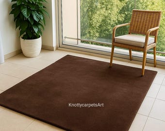 Hand-Tufted Chocolate Brown Wool Rug: Minimalist Design