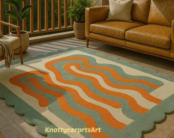 Handgetuft wollen vloerkleed met geschulpte rand, abstract golfpatroon, terracotta, turquoise en crèmekleur, voor de woonkamer en kinderkamer. Een uniek cadeau.