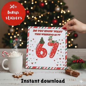 May include: A festive Christmas-themed print with the text "DO YOU KNOW WHAT THIS WEEKEND IS ??" and "December 67". The print features an elf, a Christmas tree, and red and green accents. A mug of hot chocolate, gingerbread cookies, and cinnamon sticks are also visible.