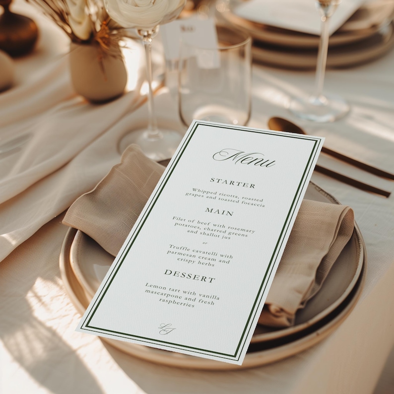 May include: A formal menu card with a green border, featuring elegant script text. The menu lists starters, main courses, and desserts. The card is placed on a plate with a folded napkin, part of a table setting.