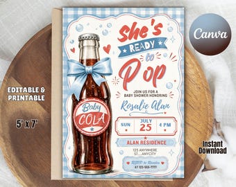 May include: A rectangular baby shower invitation card featuring a glass cola bottle with a light blue bow, red and blue text reading "She's READY to Pop", "Baby COLA", and event details including "JULY 25", "4 PM", and "ALAN RESIDENCE" on a blue gingham background.