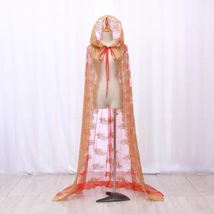 Red hooded cape with gold lace. Sheer Capulet-style cloak for fairytale wedding, masquerade, and cosplay. Cathedral-style hooded cape