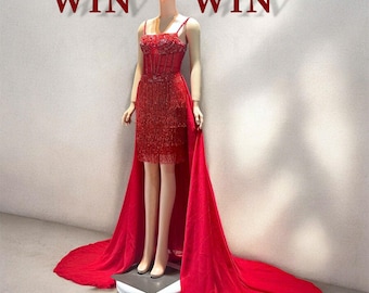 Vestido de noche con piedras preciosas bordadas a mano