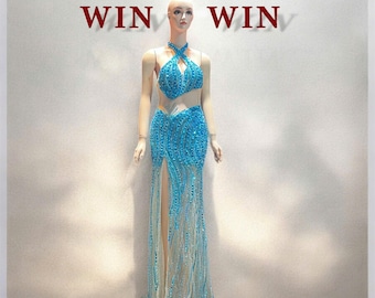 Vestido de noche con piedras preciosas bordadas a mano