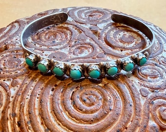 Southwest sterling silver turquoise cuff, 8 stones in snake eye settings Native American design petit point