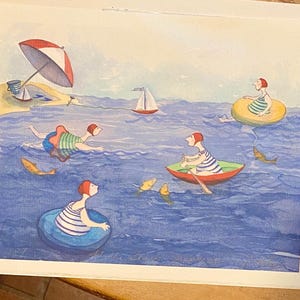 May include: Watercolor painting of a beach scene with figures in the water. A red and white striped umbrella shades a sandy shore. People swim, float in inner tubes, and row a boat. Yellow fish swim in the blue water.
