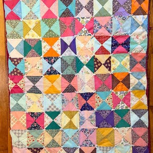 Small vintage bow tie quilt, old fabrics cheery colors, upcycle or wall hanging