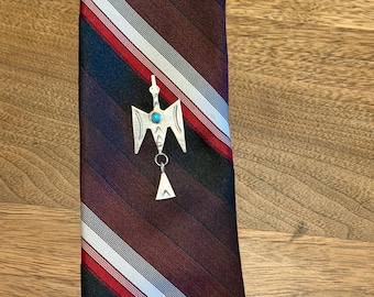 Vintage sterling silver Thunderbird tie tack with snake eye turquoise gemstone
