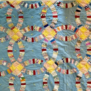 Vintage scrappy quilt, Wedding Ring pattern,  old flour sack material, do some visible mending or repurpose upcycle? Cutter quilt hand tied