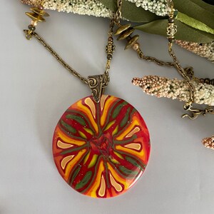 Spanish Rose Pendant on Brass Chain