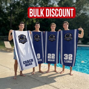 May include: Four people holding personalized navy blue and white beach towels. The towels feature the Waltham Hawks logo, stripes, and player names and numbers. The text "BULK DISCOUNT" is displayed in a red banner.