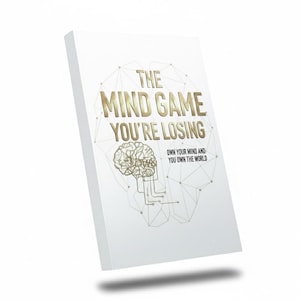 Peut inclure: Un livre blanc avec le titre "THE MIND GAME YOU'RE LOSING" en lettres dorées et un dessin de cerveau. Le sous-titre est "OWN YOUR MIND AND YOU OWN THE WORLD". La couverture présente un réseau de lignes.