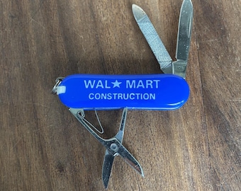 Navaja plegable de construcción vintage de Walmart, multiherramienta azul, libre de accidentes.