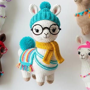 May include: A collection of crocheted llama dolls, each with unique accessories. One llama wears a blue hat, glasses, and a yellow scarf. Others feature hats, blankets, and decorative details in various colors like red, purple, and pink. These handmade toys are whimsical and colorful.
