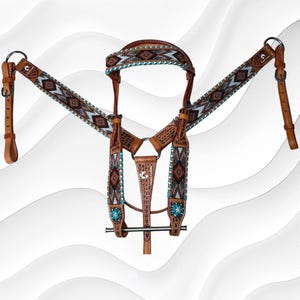 May include: A brown leather horse breast collar and headstall set featuring intricate geometric beadwork in shades of brown, white, and turquoise. The leather components include silver-toned metal hardware, buckles, and decorative turquoise-colored conchos.