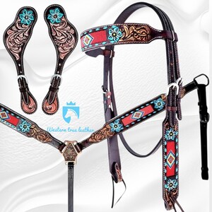 May include: A dark brown leather horse bridle and breast collar set featuring intricate floral tooling, turquoise painted flower accents, and red fabric inlays with geometric beadwork patterns. Includes matching spur straps with silver buckles.