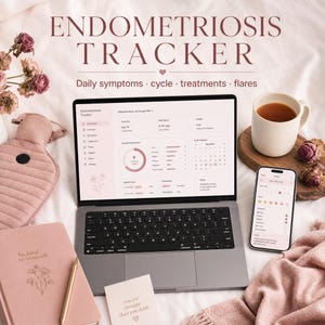 May include: A digital endometriosis tracker displayed on a laptop and smartphone screen, featuring a dashboard for symptoms, cycle, and treatments. The setup includes a pink notebook with the text be kind to yourself, a hot water bottle, and a mug.