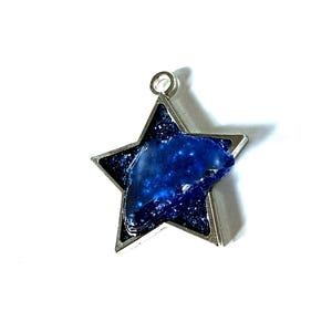 Handmade Star shaped pendant with a shard of sea glass set in resin - Jagged Twinkle.