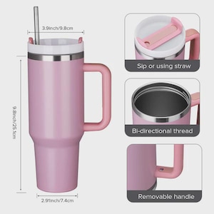 May include: A pink insulated tumbler with a handle and a stainless steel straw. The tumbler is 9.8 inches (25.1 cm) tall and 3.9 inches (9.8 cm) wide at the top. Features include a removable handle and bi-directional thread.