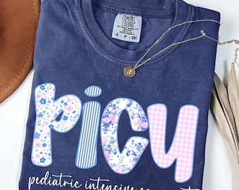 Comfort Colors® Floral PICU Nurse Shirt, Graduation Pediatric ICU Nurse Shirt, Pediatric Nurse Tee, Nurse Nightshirt, Coquette Bow RN Shirt