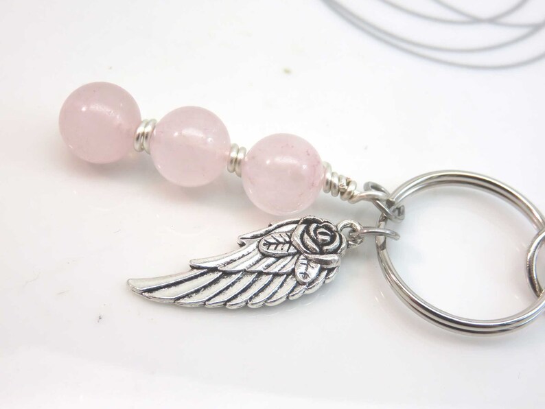 Rose quartz keyring bag charm silver angel wing feather gemstone wire wrapped