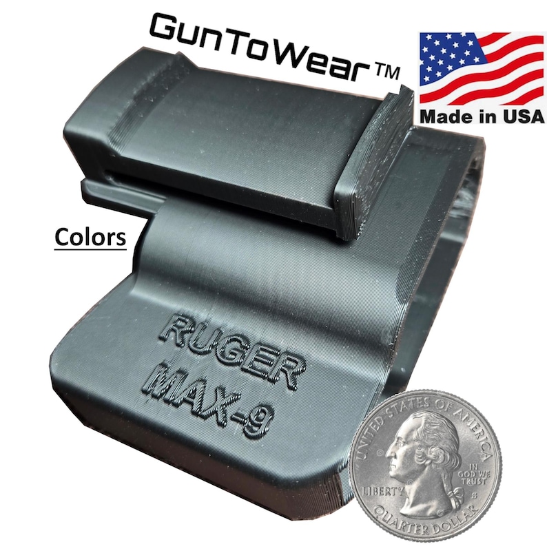 May include: A black holster for a Ruger MAX-9 pistol. The holster is made in the USA and features the text "GunToWear" and "RUGER MAX-9". A US quarter is included for size comparison. The word "Colors" is also visible.