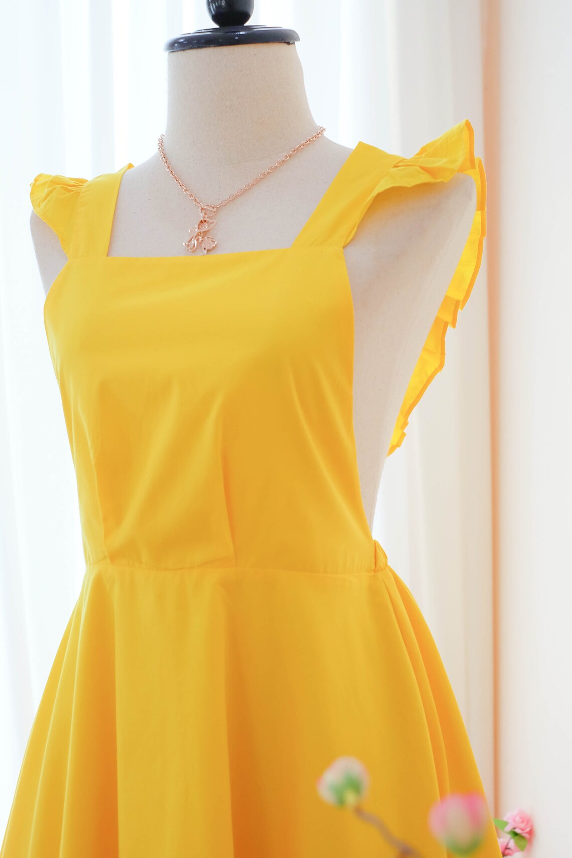 yellow suspender dress