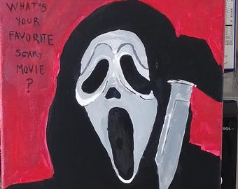 May include: A canvas painting featuring the iconic Ghostface mask from the movie Scream. The mask is white with black accents, set against a black cloak and a red background. A silver knife is held in the right hand, and the text "WHAT'S YOUR FAVORITE SCARY MOVIE?" is written on the left.