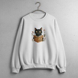 Black Cat Reading Sweatshirt: &quot;How to Train Your Human&quot; - Cat Lover Gift