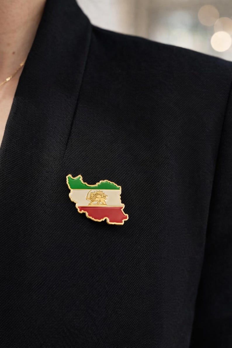 Iran Map Pin worn on a black blazer