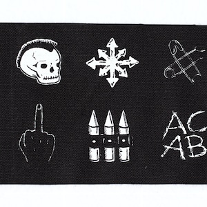 May include: Black patch with six white illustrations: a skull with a mohawk, a chaos symbol, a safety pin, a middle finger, three bullets, and the letters ACAB.