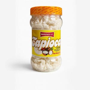 May include: A clear jar of tapioca pearls with a yellow label featuring the word "Tapioca" in a stylized font. The jar has an orange lid with "Safety Seal" text. The label also includes the text "Margnise LLC" and an illustration of tapioca.