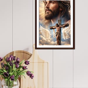 May include: A framed wall art print featuring a large, detailed portrait of a bearded man with a crown of thorns, positioned above a smaller depiction of a figure on a wooden cross against a backdrop of clouds, bright light, and white wings.