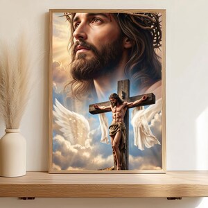 May include: A framed wall art print featuring a large, ethereal portrait of Jesus wearing a crown of thorns, positioned above a smaller depiction of Jesus on a wooden cross. The scene is set against a backdrop of soft clouds and white wings.
