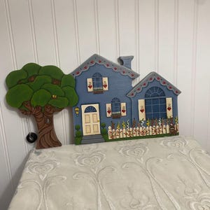 Wanddeko aus Holz, handbemalt