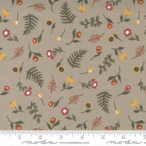 May include: A fabric with a repeating pattern of stylized flowers and leaves in shades of yellow, red, and green on a tan background. The design includes sunflowers, ferns, and other floral elements. The fabric is suitable for quilting and other craft projects.