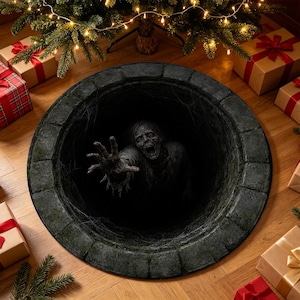 May include: A round floor mat featuring a 3D optical illusion of a dark, circular stone well. A pale, decaying zombie figure with an open mouth and outstretched hand emerges from the deep, shadowy center of the well, surrounded by cobwebs.