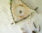 OOAK triangular eye catching dream catcher weaved in mustard yellow with seashells and many natural surprises