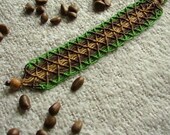 Green and  brown macrame cuff bracelet with wooden bead closure