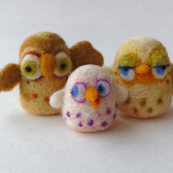 An owl family - needlefelted sculptures