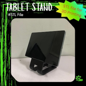 May include: A black tablet stand holding a black tablet. The stand is made of a curved, solid material. Text on the image reads "TABLET STAND" and "#STL File". A green starburst graphic says "STL file for 3D Printing".
