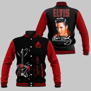 May include: Black and red varsity jacket with an Elvis Presley design. The back features the name "ELVIS" and a portrait. The front displays a guitar graphic and the words "ROCK 'N' ROLL". The jacket has a button-up front and red sleeves.
