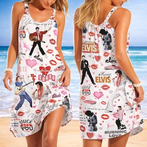 May include: White sleeveless dress featuring multiple images of Elvis Presley, hearts, and lipstick prints. The dress includes text such as "Always Elvis" and "Stuck on You". The dress is knee-length and has a scoop neckline.