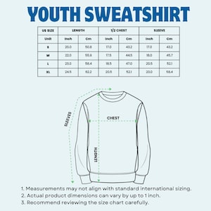 May include: A diagram of a youth sweatshirt with a size chart. The chart shows measurements in inches and centimetres for length, half chest, and sleeve for sizes S, M, L, and XL. The text "YOUTH SWEATSHIRT" is at the top.
