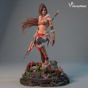 May include: A detailed statue of a female warrior, posed with a spear. She wears a brown and red outfit with fur accents and white markings. The statue is on a stone base with plants and the VersaNest Studio logo.